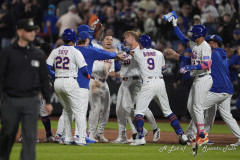 NEW YORK — MAY 12: New York Mets first baseman Pete Alonso (20) is congratulated by teammates for hitting a game winning sacrifice fly ball against the Pittsburgh Pirates during the ninth inning at Citi Field on May 12, 2025, in Queens, NY. (Gregory Fisher/A Lot of Sports Talk)