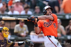 Baltimore, MD - July 27, 2024: Baltimore Orioles outfielder Anthony Santander (25) hits a foul ball during the game between the Baltimore Orioles and San Diego Pardres at  Oriole Park at Camden Yards in Baltimore, MD.   (Photo by Elliott Brown/A Lot of Sports Talk)