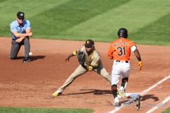 Baltimore, MD - July 27, 2024: Baltimore Orioles outfielder Cedric Mullins (31) gets thrown out at first base during the game between the Baltimore Orioles and San Diego Pardres at  Oriole Park at Camden Yards in Baltimore, MD.   (Photo by Elliott Brown/A Lot of Sports Talk)