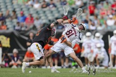 PHILADELPHIA, PENNSYLVANIA – MAY 25: Maryland fo LUKE WIERMAN (52) pushes Virginia fo THOMAS COLUCCI (81) off of the ball during a face-off in the game between Maryland and Virginia during the 2024 NCAA Men’s Lacrosse Tournament semifinal game at Lincoln Financial Field on May 25, 2024, in Philadelphia, PA  (Scotty Rausenberger/A Lot of Sports Talk)