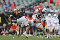 PHILADELPHIA, PENNSYLVANIA – MAY 25: Maryland fo LUKE WIERMAN (52) pushes Virginia fo THOMAS COLUCCI (81) off of the ball during a face-off in the game between Maryland and Virginia during the 2024 NCAA Men’s Lacrosse Tournament semifinal game at Lincoln Financial Field on May 25, 2024, in Philadelphia, PA  (Scotty Rausenberger/A Lot of Sports Talk)