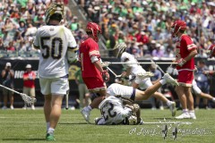 PHILADELPHIA, PENNSYLVANIA – MAY 25: Notre Dame midfielder MAX BUSENKELL (23) falls on his head in the first half of the game between Notre Dame and Denver during the 2024 NCAA Men’s Lacrosse Tournament semifinal game at Lincoln Financial Field on May 25, 2024, in Philadelphia, PA  (Scotty Rausenberger/A Lot of Sports Talk)