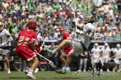 PHILADELPHIA, PENNSYLVANIA – MAY 25: Notre Dame attack CHRIS KAVANAGH (50) takes an off balance shot on goal in the second half of the game between Notre Dame and Denver during the 2024 NCAA Men’s Lacrosse Tournament semifinal game at Lincoln Financial Field on May 25, 2024, in Philadelphia, PA  (Scotty Rausenberger/A Lot of Sports Talk)