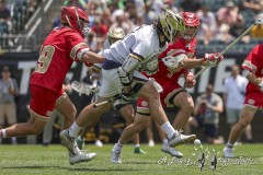 PHILADELPHIA, PENNSYLVANIA – MAY 25: Notre Dame attack JAKE TAYLOR (13) attempts a between the legs shot in the second half of the game between Notre Dame and Denver during the 2024 NCAA Men’s Lacrosse Tournament semifinal game at Lincoln Financial Fieldon May 25, 2024, in Philadelphia, PA  (Scotty Rausenberger/A Lot of Sports Talk)