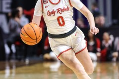 March 13, 2024: UNLV Lady Rebels guard Ashley Scoggin (0) dribbles the ball during the second half of the finals of the Women’s Mountain West Conference tournament, Wednesday, March 13, 2024, in Las Vegas. Christopher Trim/A Lot of Sports Talk.
