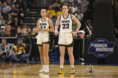 ALBANY, NEW YORK – MARCH 30: Iowa guards CAITLIN CLARK (22) and GABBIE MARSHALL (24) look on as their teammate takes a free-throw attempt during the 2024 NCAA Women’s Basketball Tournament Albany 2 Regional semifinal at MVP Arena on March 30, 2024, in Albany, N.Y.  (Scotty Rausenberger/A Lot of Sports Talk)