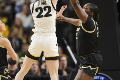 ALBANY, NEW YORK – MARCH 30:  Iowa guard CAITLIN CLARK (22) puts up a shot over a Colorado defender during the 2024 NCAA Women’s Basketball Tournament Albany 2 Regional semifinal at MVP Arena on March 30, 2024, in Albany, N.Y.  (Scotty Rausenberger/A Lot of Sports Talk)