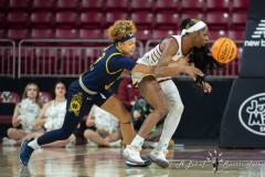 CHESTNUT HILL, MA - JANUARY 23: Notre Dame Fighting Irish guard Hannah Hidalgo (3) reaches for the ball from Boston College Eagles guard Dontavia Waggoner (24) during a women’s college basketball game between the Notre Dame Fighting Irish and the Boston College Eagles on January 23, 2025, at Conte Forum in Chestnut Hill, MA. (Photo by Erica Denhoff/Icon Sportswire)