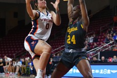 CHESTNUT HILL, MA - FEBRUARY 08: Virginia Cavaliers guard Olivia McGhee (0) shoots the ball while defended by Boston College Eagles guard Dontavia Waggoner (24) during a women’s college basketball game between the Virginia Cavaliers and the Boston College Eagles on February 8, 2024 at Conte Forum in Chestnut Hill, MA. (Photo by Erica Denhoff/Icon Sportswire)