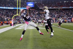 Kenbrell Thompkins' third catch of the game proved to be his fourth TD of the season - and the game-winning score against the Saints. (Rob Carr/Getty Images)