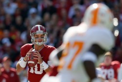 AJ McCarron may be two solid performances away from possibly sewing up the Heisman Trophy. (Kevin C. Cox/Getty Images)