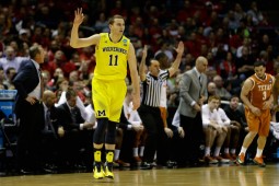 Along with hitting four three-pointers, Nik Stauskas tied a career high with eight assists in Michigan's win over Texas. (Mike McGinnis/Getty Images)