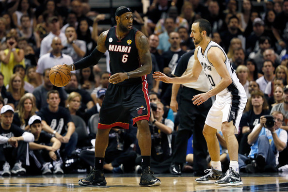 Will LeBron James win his third consecutive title with the Heat, or will Manu Ginobili get revenge from last season and secure the Spurs' fifth championship? (Kevin C. Cox/Getty Images)