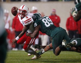 The Spartans' defense, led by Bednarik Award semifinalist Shilique Calhoun (r.), are looking to stop the roll Ohio State's offense has been on in the past month. (Gregory Shamus/Getty Images)
