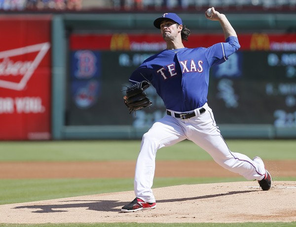 When Texas traded for Cole Hamels at the trade deadline, the Rangers were eight games out of first place in the AL West. On Thursday, Hamels, after helping Texas to the AL West title, will start Game 2 vs. Toronto. (Brandon Wage/Getty Images