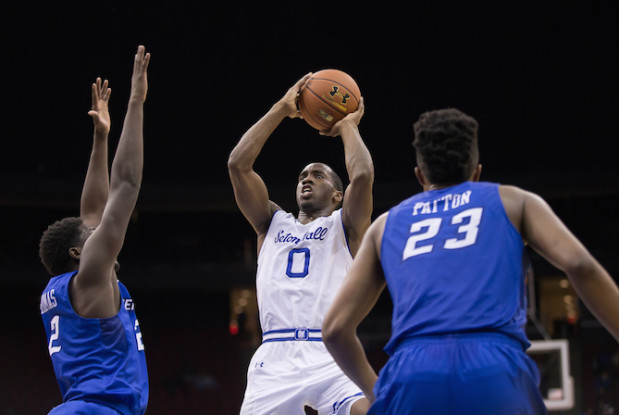 No matter how many players surrounded Khadeen Carrington (0), he managed to have his way with Creighton, scoring 41 points - including making 18 of 22 free throws - to help the Pirates to their second win over a ranked team this season. (Photo by Robert Cole)