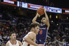 Washington, DC - March 13, 2022: Richmond Spiders guard Jacob Gilyard (0) takes a shot during the Atlantic 10 championship game between Richmond and VCU at  Capital One Arena in Washington, DC.   (Photo by Elliott Brown/A Lot of Sports Talk)