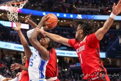 Washington, DC - March 14, 2024: Duke Blue Devils forward Mark Mitchell (25) gets fouled during the quarterfinal round of the 2024 ACC Tournament between Duke and NC State at Capital One Arena in Washington, DC.  (Photo by Elliott Brown/A Lot of Sports Talk)