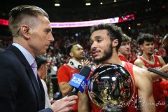 March 16, 2024: New Mexico Lobos guard Jaelen House (10) holds the MVP trophy while speaking with CBS reporter Evan Washburn after winning the Men’s Mountain West Conference tournament, Saturday, March 16, 2024, in Las Vegas, NV. Christopher Trim/A Lot of Sports Talk.