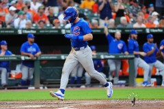 BALTIMORE — JULY 11: Chicago Cubs second baseman Nico Hoerner (2) scores a run on Chicago Cubs first baseman Michael Busch (not pictured) RBI double against the Baltimore Orioles during the fifth inning inside Oriole Park at Camden Yards on July 11, 2024, in Baltimore, Maryland. (Gregory Fisher/A Lot of Sports Talk)