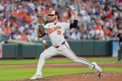 BALTIMORE — JULY 11: Baltimore Orioles pitcher Cole Irvin (19) delivers a pitch against the Chicago Cubs during the sixth inning inside Oriole Park at Camden Yards on July 11, 2024, in Baltimore, Maryland. (Gregory Fisher/A Lot of Sports Talk)