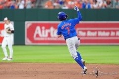 BALTIMORE — JULY 11: Chicago Cubs shortstop Dansby Swanson (7) reacts to hitting a home run as he rounds the bases against the Baltimore Orioles during the sixth inning inside Oriole Park at Camden Yards on July 11, 2024, in Baltimore, Maryland. (Gregory Fisher/A Lot of Sports Talk)