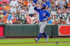 BALTIMORE — JULY 11: Chicago Cubs shortstop Dansby Swanson (7) reacts to hitting a home run as he rounds the bases against the Baltimore Orioles during the sixth inning inside Oriole Park at Camden Yards on July 11, 2024, in Baltimore, Maryland. (Gregory Fisher/A Lot of Sports Talk)