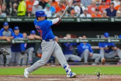 BALTIMORE — JULY 11: Chicago Cubs right fielder Seiya Suzuki (27) hits an RBI triple against the Baltimore Orioles during the seventh inning inside Oriole Park at Camden Yards on July 11, 2024, in Baltimore, Maryland. (Gregory Fisher/A Lot of Sports Talk)