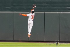 BALTIMORE — JULY 11:  Baltimore Orioles center fielder Cedric Mullins (31) attempts to making a leaping catch of Chicago Cubs right fielder Seiya Suzuki (27) RBI triple during the seventh inning inside Oriole Park at Camden Yards on July 11, 2024, in Baltimore, Maryland. (Gregory Fisher/A Lot of Sports Talk)