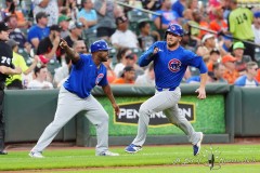 BALTIMORE — JULY 11: Chicago Cubs first baseman Michael Busch (29) scores a run on Chicago Cubs right fielder Seiya Suzuki (not pictured) RBI triple against the Baltimore Orioles during the seventh inning inside Oriole Park at Camden Yards on July 11, 2024, in Baltimore, Maryland. (Gregory Fisher/A Lot of Sports Talk)