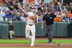 BALTIMORE — JULY 11: Baltimore Orioles third baseman Jordan Westburg (11) throws out Chicago Cubs rightfielder Seiya Suzuki (not pictured) after fielding a ground ball during the ninth inning inside Oriole Park at Camden Yards on July 11, 2024, in Baltimore, Maryland. (Gregory Fisher/A Lot of Sports Talk)