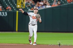 BALTIMORE — JULY 11: Baltimore Orioles shortstop Gunnar Henderson (2) throws out Chicago Cubs designated hitter Christopher Morel (not pictured) after fielding a ground ball during the ninth inning inside Oriole Park at Camden Yards on July 11, 2024, in Baltimore, Maryland. (Gregory Fisher/A Lot of Sports Talk)