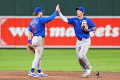 BALTIMORE — JULY 11: Chicago Cubs second baseman Nico Hoerner (2) and right fielder Seiya Suzuki (27) hi five to celebrate the victory against the Baltimore Orioles after the ninth inning inside Oriole Park at Camden Yards on July 11, 2024, in Baltimore, Maryland. (Gregory Fisher/A Lot of Sports Talk)