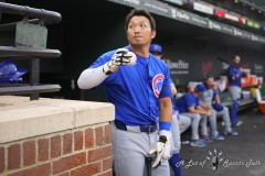 BALTIMORE — JULY 11: Chicago Cubs rightfielder Seiya Suzuki (27) signs a baseball for a fan prior to the start of the game against the Baltimore Orioles inside Oriole Park at Camden Yards on July 11, 2024, in Baltimore, Maryland. (Gregory Fisher/A Lot of Sports Talk)