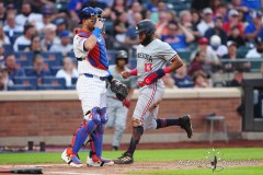 NEW YORK — JULY 29: Minnesota Twins designated hitter Manuel Margot (13) scores a run on Minnesota Twins center fielder Byron Buxton (not pictured) RBI single against the New York Mets during the first inning at Citi Field on July 29, 2024, in New York, New York. (Gregory Fisher/A Lot of Sports Talk)