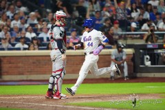 NEW YORK — JULY 29: New York Mets center fielder Harrison Bader (44) scores a run on New York Mets designated hitter JD Martinez (not pictured) sacrifice fly ball against the Minnesota Twins during the fourth  inning at Citi Field on July 29, 2024, in New York, New York. (Gregory Fisher/A Lot of Sports Talk)