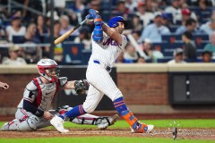 NEW YORK — JULY 29: New York Mets second baseman Jeff McNeil (1) hits a sacrifice fly ball against the Minnesota Twins during the sixth  inning at Citi Field on July 29, 2024, in New York, New York. (Gregory Fisher/A Lot of Sports Talk)