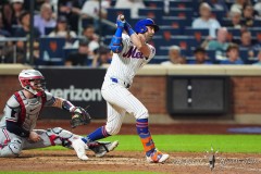 NEW YORK — JULY 29: New York Mets second baseman Jeff McNeil (1) hits an RBI double against the Minnesota Twins during the seventh inning at Citi Field on July 29, 2024, in New York, New York. (Gregory Fisher/A Lot of Sports Talk)