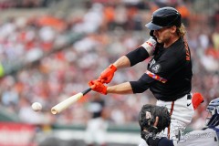 BALTIMORE — JULY 12: Baltimore Orioles shortstop Gunnar Henderson (2) hits an infield single against the New York Yankees during the first inning inside Oriole Park at Camden Yards on July 12, 2024, in Baltimore, Maryland. (Gregory Fisher/A Lot of Sports Talk)