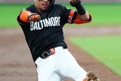 BALTIMORE — JULY 12: Baltimore Orioles third baseman Ramon Urias (29) slides safely into third base with an RBI triple against the New York Yankees during the second inning inside Oriole Park at Camden Yards on July 12, 2024, in Baltimore, Maryland. (Gregory Fisher/A Lot of Sports Talk)