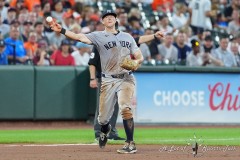 BALTIMORE — JULY 12:  New York Yankees third baseman DJ LeMahieu (26) throws out Baltimore Orioles second baseman Jordan Westburg (not pictured) after fielding a ground ball during the fourth inning inside Oriole Park at Camden Yards on July 12, 2024, in Baltimore, Maryland. (Gregory Fisher/A Lot of Sports Talk)