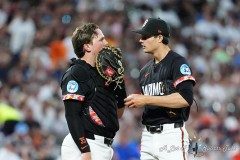 BALTIMORE — JULY 12: Baltimore Orioles catcher Adley Rutschman (35) speaks with Baltimore Orioles pitcher Cade Povich (37) during the fifth inning inside Oriole Park at Camden Yards on July 12, 2024, in Baltimore, Maryland. (Gregory Fisher/A Lot of Sports Talk)