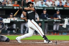 BALTIMORE — JULY 12: Baltimore Orioles right fielder Anthony Santander (25) hits a single against the New York Yankees during the sixth inning inside Oriole Park at Camden Yards on July 12, 2024, in Baltimore, Maryland. (Gregory Fisher/A Lot of Sports Talk)