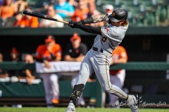Baltimore, MD - August 6, 2022: Pittsburgh Pirates left fielder Ben Gamel (18) hits a single during the game between the Baltimore Orioles and Pittsburgh Pirates at  Oriole Park at Camden Yards in Baltimore, MD.   (Photo by Elliott Brown/A Lot of Sports Talk)