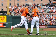 Baltimore, MD - June 1, 2024: Baltimore Orioles first base Ryan Mountcastle (6) shakes Baltimore Orioles third base coach Tony Mansolino (36) hand after hitting a homerun during the game between the Baltimore Orioles and Tampa Bay Rays at  Oriole Park at Camden Yards in Baltimore, MD.   (Photo by Elliott Brown/A Lot of Sports Talk)