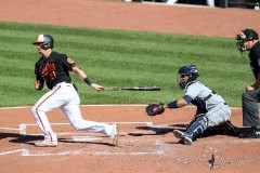Baltimore, MD - June 18, 2022: Baltimore Orioles left fielder Austin Hays (21) hits a single during the game between the Baltimore Orioles and Tampa Bay Rays at  Oriole Park at Camden Yards in Baltimore, MD.   (Photo by Elliott Brown/A Lot of Sports Talk)