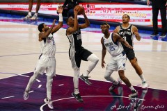 DALLAS, TX - FEBRUARY 23: The Dallas Mavericks during action against the San Antonio Spurs at American Airlines Center in Dallas, TX (Photo by Ross James/ALOST)