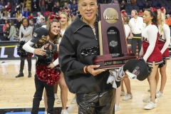 ALBANY, NEW YORK – MARCH 31:  South Carolina Head Coach DAWN STALEY poses with the Regional Championship trophy after the 2024 NCAA Women’s Basketball Tournament Albany 1 Regional Final at MVP Arena on March 31, 2024, in Albany, N.Y.  (Scotty Rausenberger/A Lot of Sports Talk)