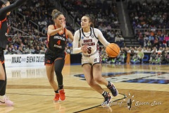 ALBANY, NEW YORK – MARCH 31: South Carolina guard TESSA JOHNSON (5) drives the lane past Oregon State defender DONOVYN HUNTER (4) during the 2024 NCAA Women’s Basketball Tournament Albany 1 Regional Final at MVP Arena on March 31, 2024, in Albany, N.Y.  (Scotty Rausenberger/A Lot of Sports Talk)