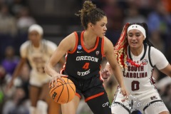 ALBANY, NEW YORK – MARCH 31:  Oregon State guard DONOVYN HUNTER (4) back down South Carolina defender TE-HINA PAOPAO (0) during the 2024 NCAA Women’s Basketball Tournament Albany 1 Regional Final at MVP Arena on March 31, 2024, in Albany, N.Y.  (Scotty Rausenberger/A Lot of Sports Talk)